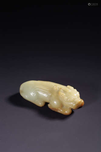 A CARVED WHITE JADE MYTHICAL BEAST,QING DYNASTY