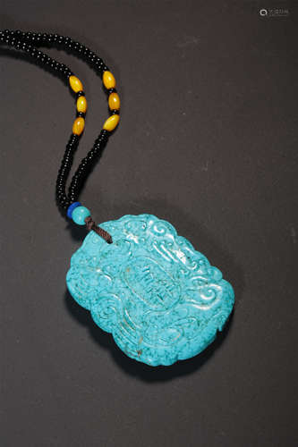 A CARVED TURQUOISE PENDANT,QING DYNASTY