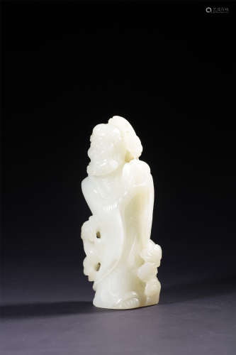 A CARVED WHITE JADE FIGURE OF LUOHAN QING DYNASTY