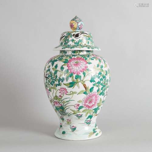 A Chinese Famille Rose Temple Jar and Wood Stand (Da Qing Qi...