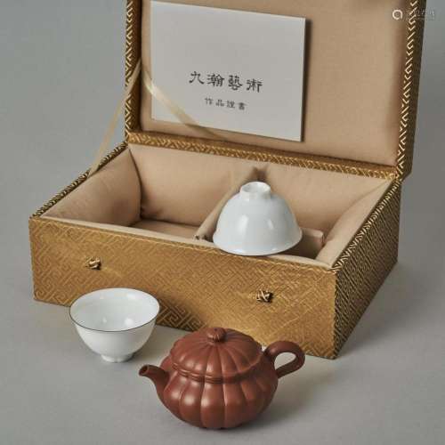 A Chinese Red Clay Teapot (Wang Shuyun Mark) and Two White-g...