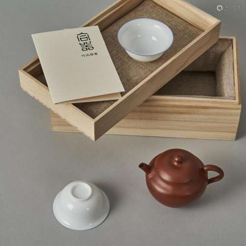 A Chinese Red Clay Teapot (Wu Fang Qin Zhi Mark) and Two Whi...