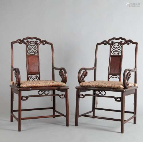 A Pair of 20th Century Chinese Rosewood Armchairs (one damag...