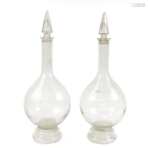 Pair of large 19th century apothecary glass jars with stoppe...