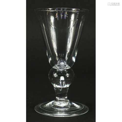 Early 18th century wine glass with folded foot and knopped s...