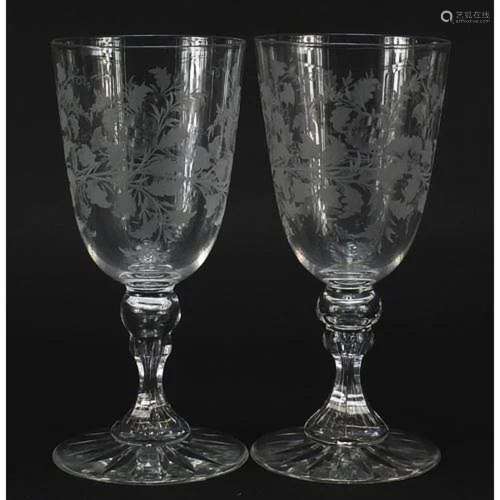Pair of Edwardian wine glasses etched with leaves and berrie...