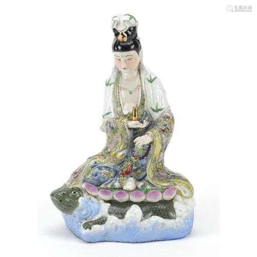 Chinese porcelain figure of Guanyin riding a tortoise hand p...