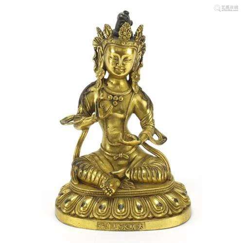Chino Tibetan gilt bronze figure of seated Buddha, 20cm high