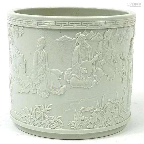 Chinese porcelain blanc de chine brush pot decorated in reli...
