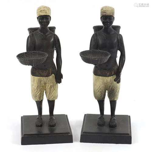 Pair of cold painted bronze figures of African slaves, each ...