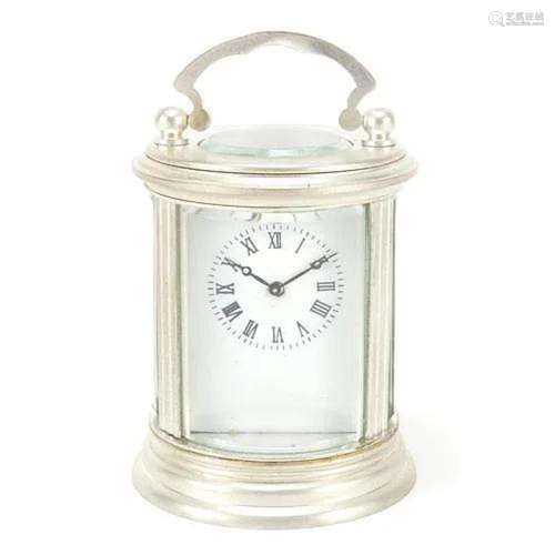 Miniature silvered cylindrical carriage clock with enamelled...