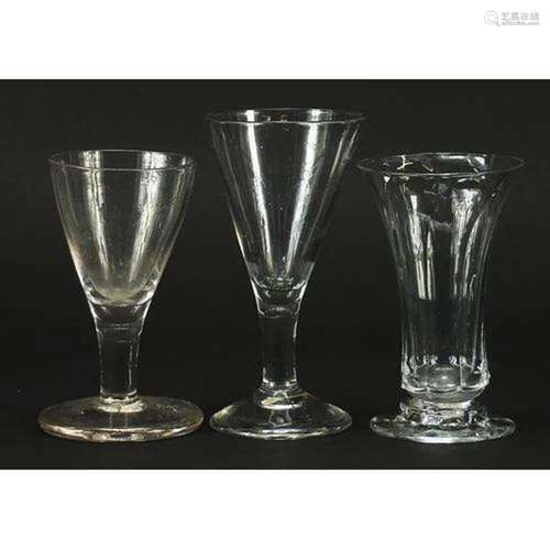 Three 18th century firing glasses, the largest 11.5cm high