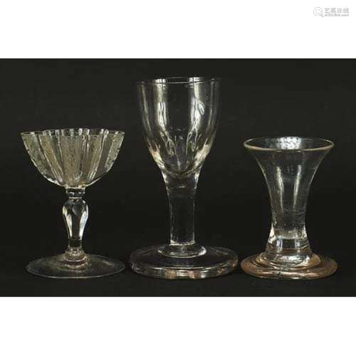 Three antique firing glasses including one with etched bowl,...