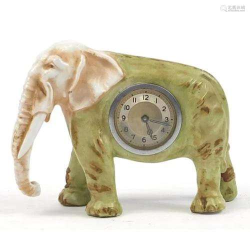 Continental porcelain elephant mantle clock, 18cm in length