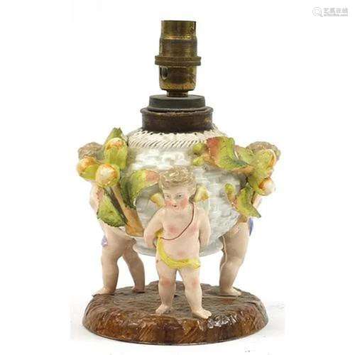 Plaue Putti design porcelain lamp, impressed marks to the ba...