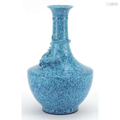 Chinese porcelain vase having a blue glaze decorated in reli...