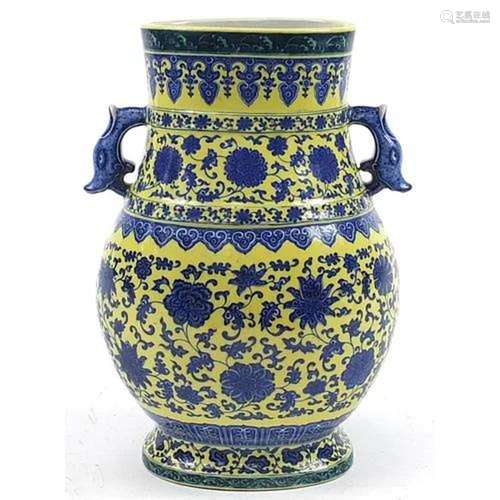 Large Chinese blue and yellow porcelain vase with twin handl...