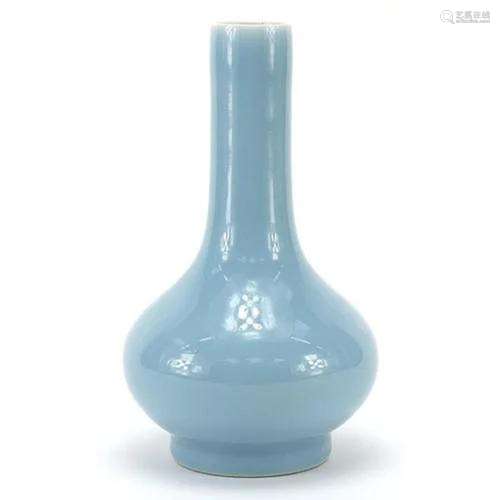 Chinese porcelain vase having a clair de lune glaze, six fig...