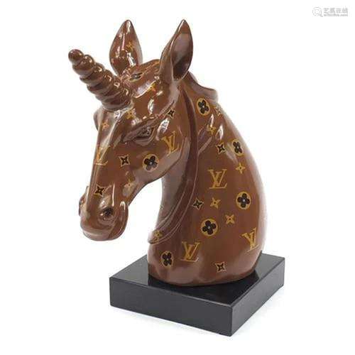 Louis Vuitton design bust of a unicorn raised on a square bl...