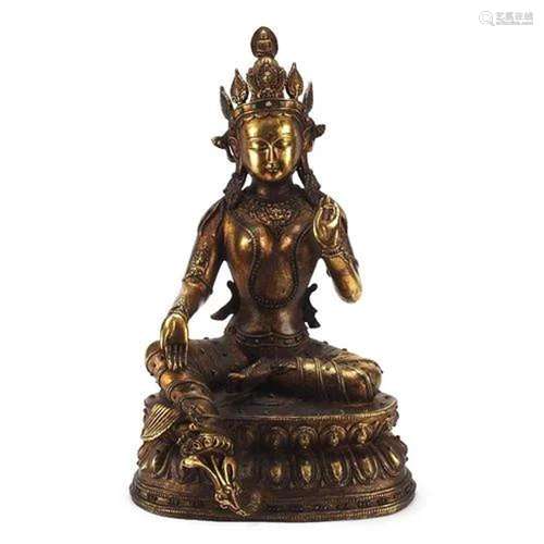 Large Chino Tibetan gilt bronze and jewelled figure of seate...