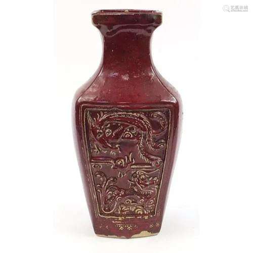 Large Chinese porcelain vase having a sang de boeuf glaze, d...