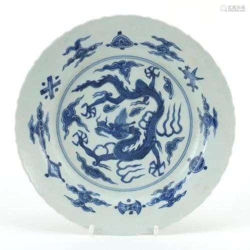Chinese blue and white porcelain plate hand painted with a d...