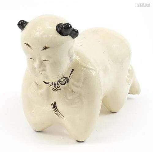 Chinese porcelain figural pillow, 35cm in length