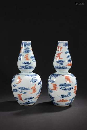 PAIR OF CHINESE BLUE AND WHITE IRON RED GOURD VASES