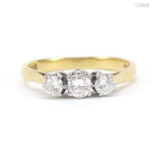 18ct gold three stone ring, size J/K, 2.8g