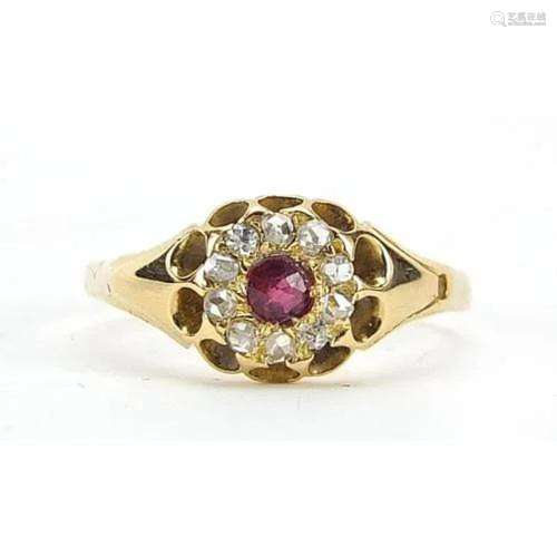 18ct gold ruby and diamond ring with pierced setting, size M...