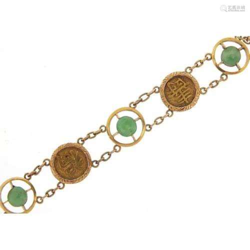 Chinese 14ct gold bracelet set with seven green jade cabocho...