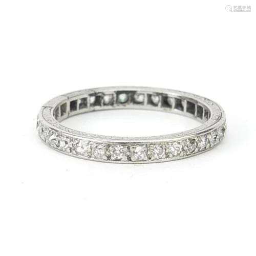 Unmarked white metal diamond eternity ring, the diamonds app...