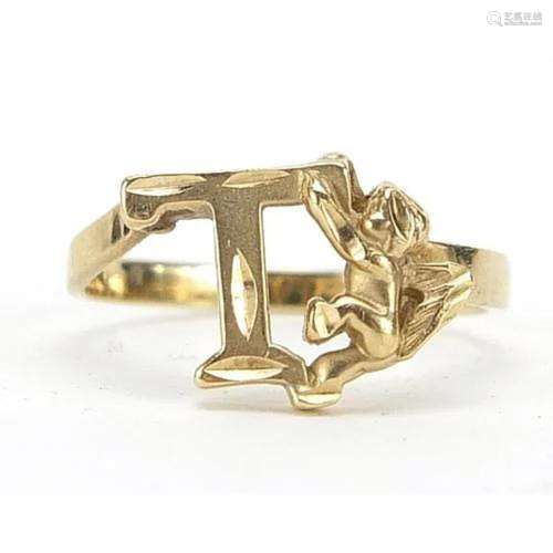 10ct gold initial T and Putti ring housed in a C. Desprez Br...