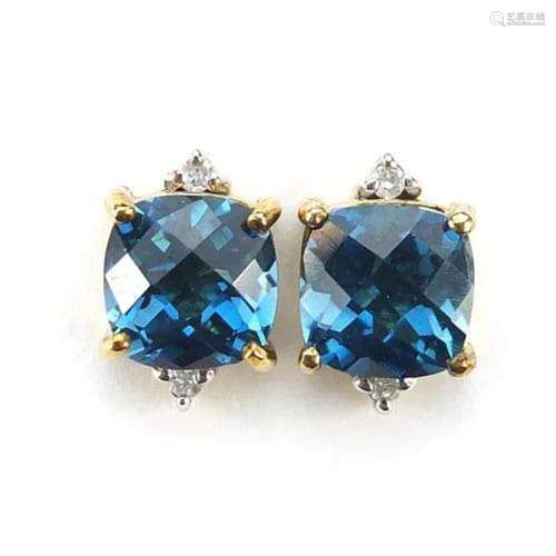 Pair of 9ct gold blue stone and diamond stud earrings, possi...