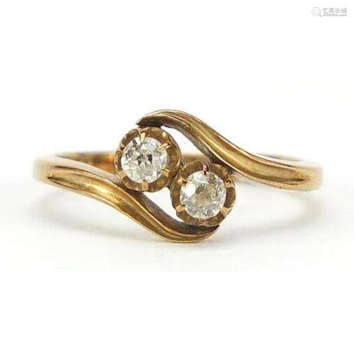18ct gold diamond two stone crossover ring, size M, 3.1g