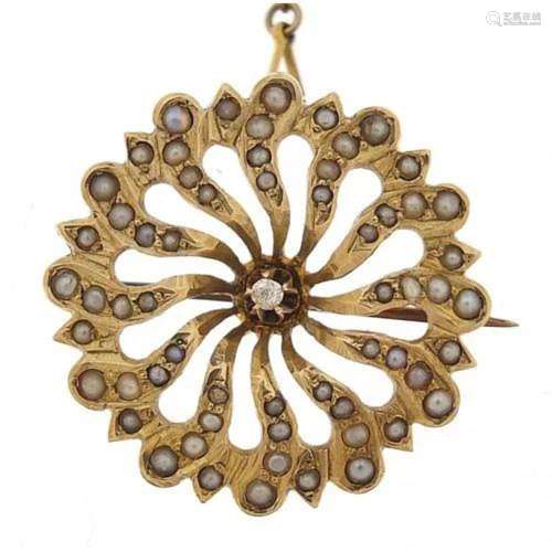 Unmarked gold seed pearl brooch set with a central diamond, ...