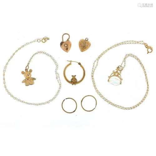 9ct gold jewellery including three necklaces, teddy bear pen...