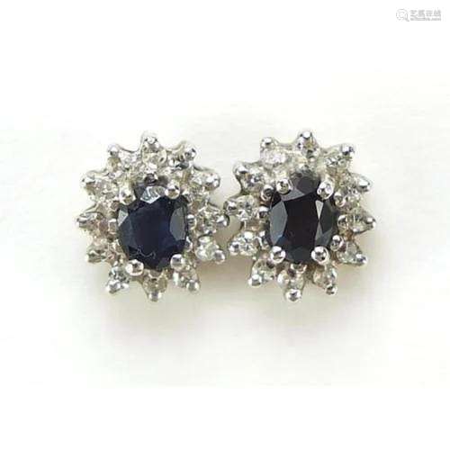 Pair of 9ct gold sapphire and diamond cluster stud earrings,...