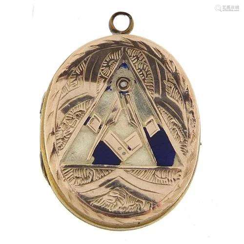 Oval gilt metal and enamel masonic locket, 3cm high, 8.4g