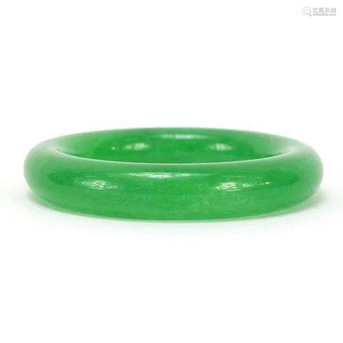 Chinese green jade bangle, 8.2cm in diameter, 80.2g