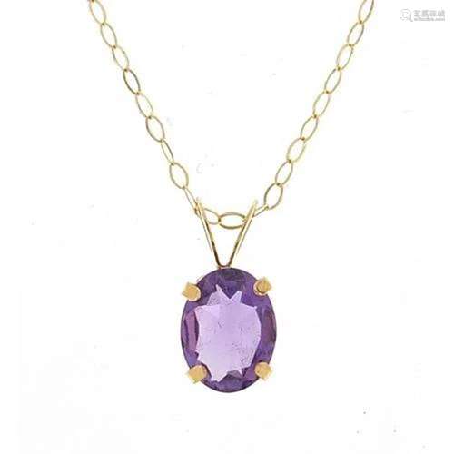 9ct gold amethyst pendant on a 9ct gold necklace, 1.3cm high...