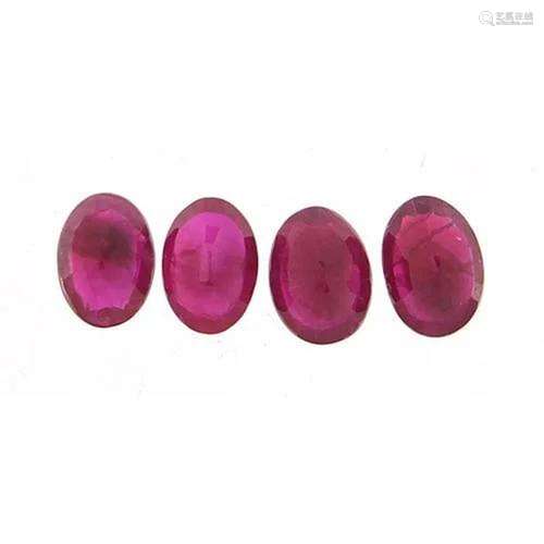 Four ruby gemstones, each 7mm x 5mm