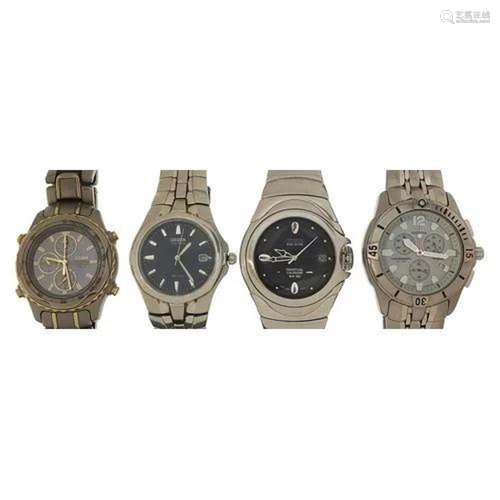 Four gentlemen's Citizen Eco Drive wristwatches with box...