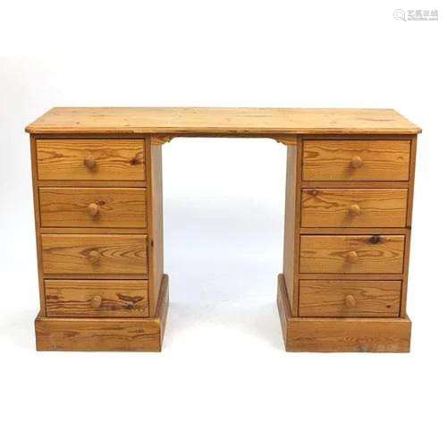 Pine dressing table with eight drawers, 77cm H x 126cm W x 4...