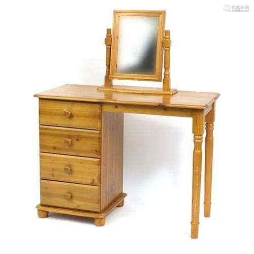 Pine four drawer dressing table and a swing mirror, the dres...