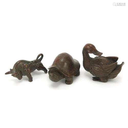 Three Japanese patinated bronze animals comprising duck, tor...
