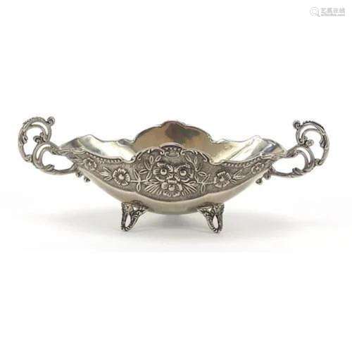 Heavy silver plated twin handled bowl cast with flowers and ...