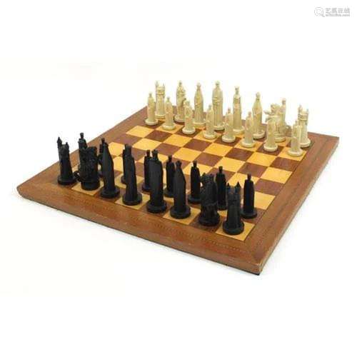 Inlaid wooden chess board with medieval design chess set, th...