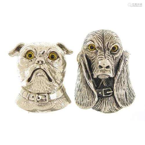 Two sterling silver dog's head brooch pendants, the larg...