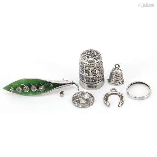 Silver items including a silver and enamel leaf brooch, napk...